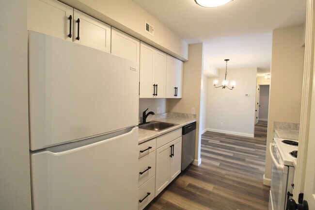 Photo - Fun and Stylish Living at Madison Manor! Top-Floor Condo with Vaulted Ceilings and Skylights