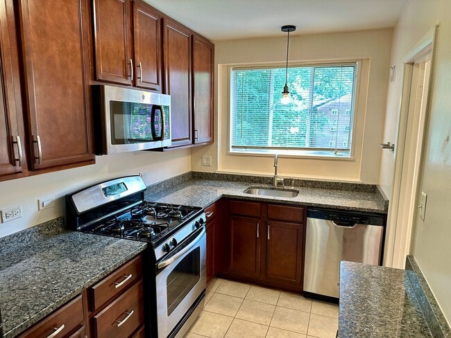 Photo - Light filled one-bedroom condo located in ... Unit M-201,
