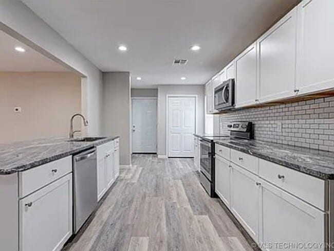 Photo - Spacious and Updated Three Bedroom Home with Large Backyard!!