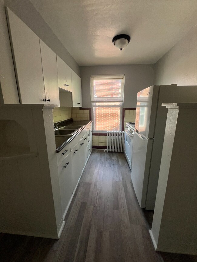 Photo - Spacious, Newly Updated 1-Bed Near UC & Downtown — Off-Street Parking, Radiant Heat Unit 4