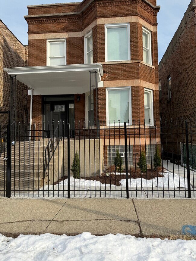 Building Photo - 7123 S Cornell Ave