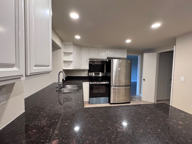 Photo - Spacious House with pool, family room, garage, deck and low maintenance landscaping