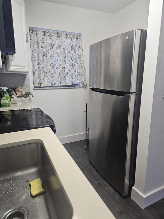 Photo - 6055 W 19th Ave Unidad 209