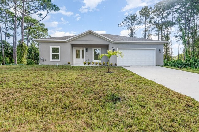 Photo - BRAND NEW! 4/2 PALM BAY!