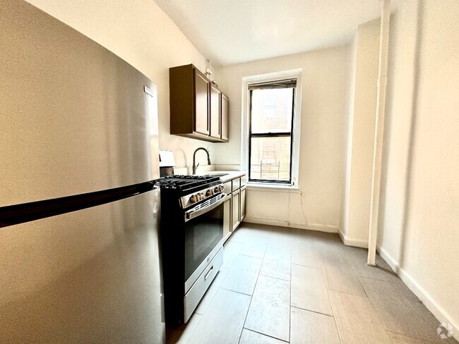 Building Photo - 5008 Broadway- Rental