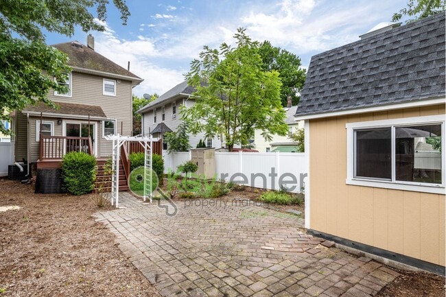 Photo - Spacious 3BR Home with Finished Attic, Fenced Yard & Easy NYC Commute – No Broker Fee