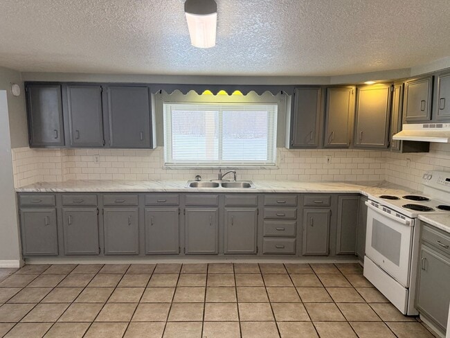 Building Photo - Austin - 10016/10020 Unit A