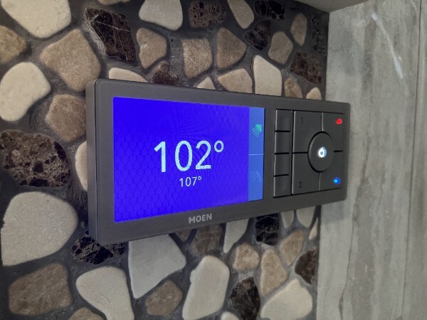 Digital controller in both showers. Help control temperature, water source, etc.