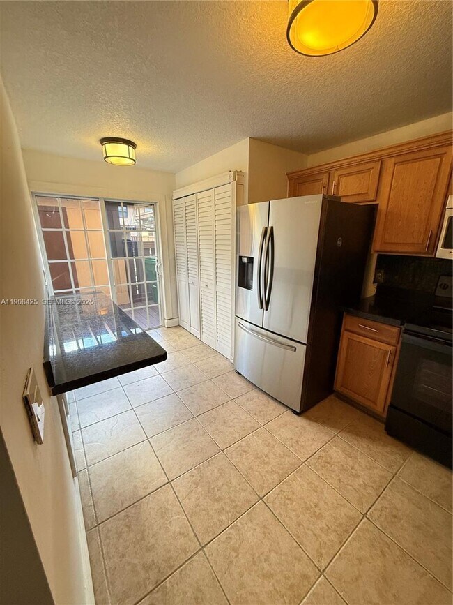 Photo - 9986 Royal Palm Blvd