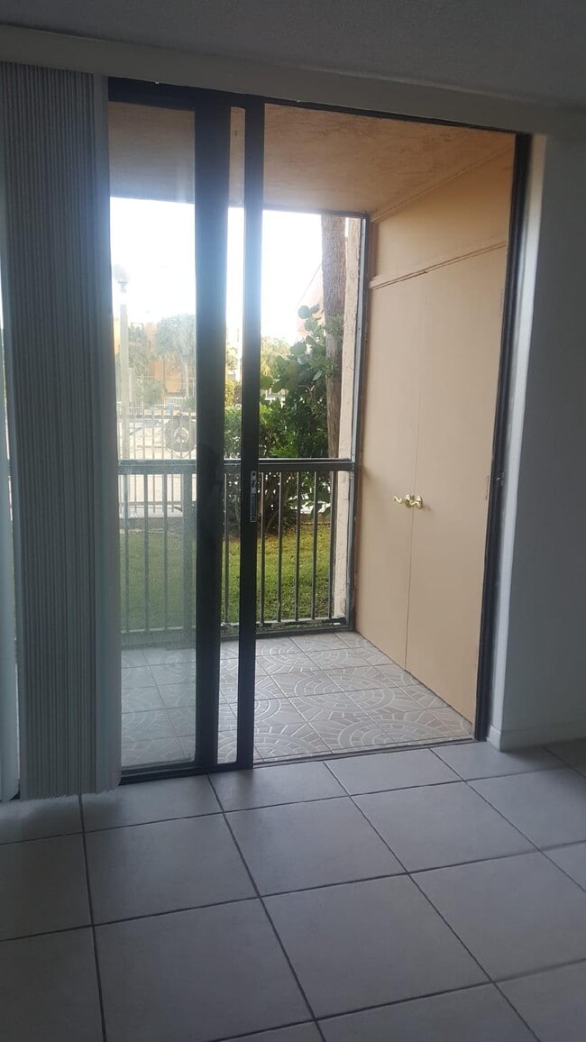 Patio with washer,Dryer & Storage - 14415 SW 88th St Unit G106