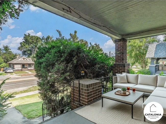 Large covered front porch. - 2025 8th Ave Unit Whole House