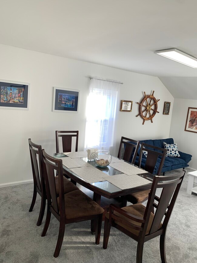 Living Room/Dining Room - 214 Beach 27th St Unit 2