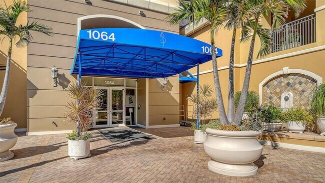 Building Photo - 1064 N Tamiami Trl Unit 1320