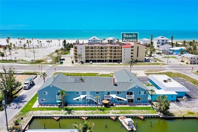 Building Photo - 6151 Estero Blvd Unit 5