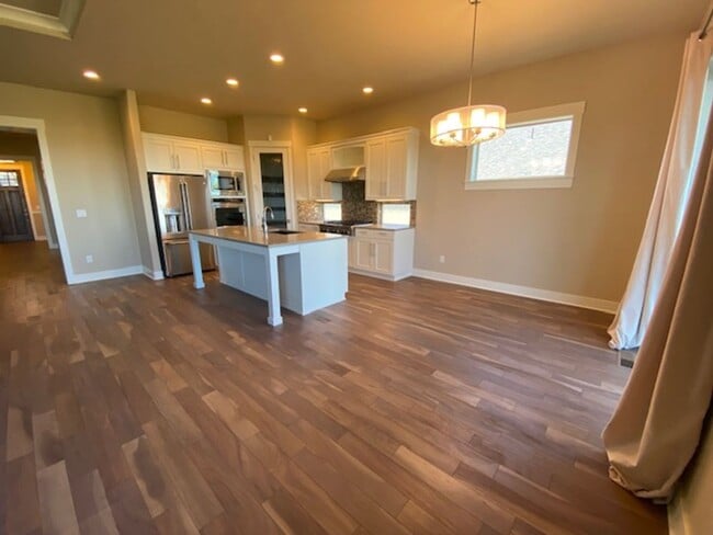 Photo - Custom home looking over Rivers Edge golf course