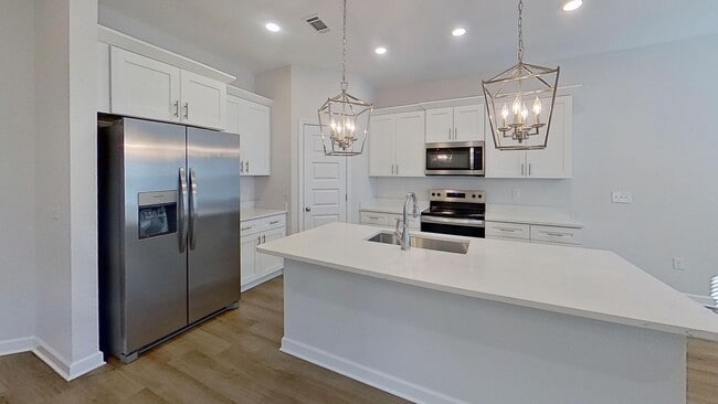 Photo - Brand New 3/2 home with fenced yard