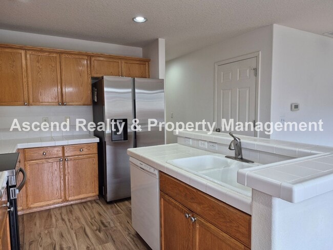 Photo - Bethany 3 Bed + Office on Main Fenced Back Yard w/Deck 2 Car Attached Garage Available Now!