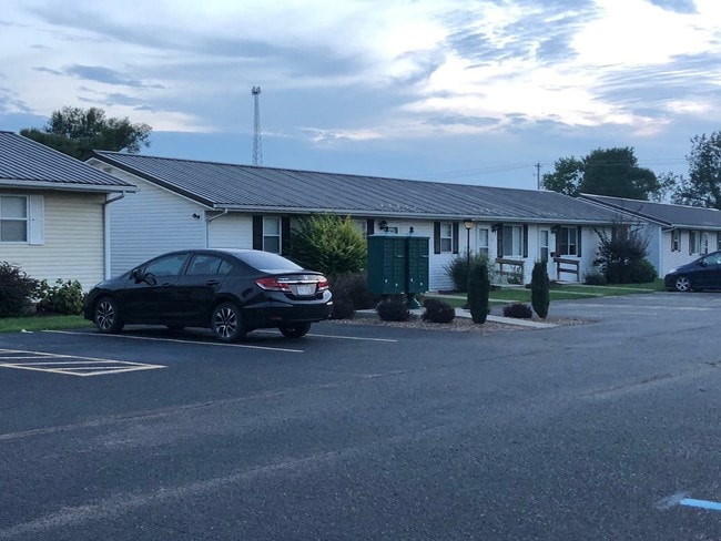 Parking in front of units, secured mailboxes on site - 109 N Plains Rd Unit NPV