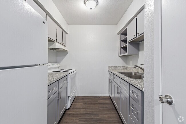 3BR, 2BA - 1,158SF - Kitchen - Villa Nueva Apartments