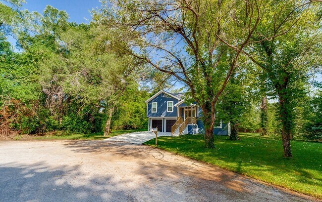 Photo - AVAILABLE SOON: Move-In Ready 4-Bedroom Beauty with Modern Finishes & Spacious Yard!