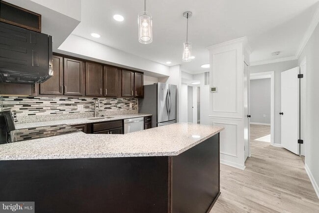 Building Photo - 8103 Greenspring Way Unit 8103-D