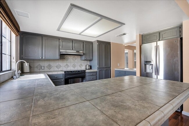 Photo - This home is loaded with upgrades and space in North Hanford.  Call today!