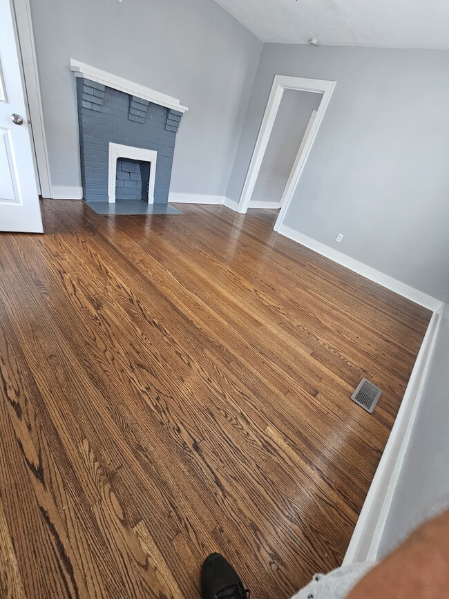 charming fireplace with mantle - 127 E Park Ave Unit A