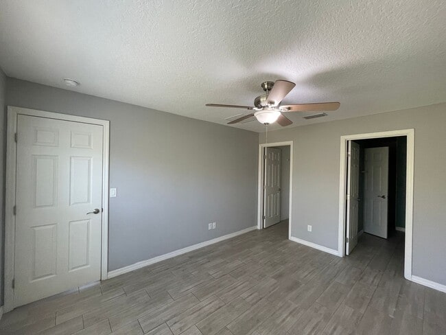 Photo - Modern 3-Bedroom Home with Office & Spacious Yard in Deltona Lakes!