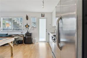 Photo - 7440 Byron Ave Unidad 1B