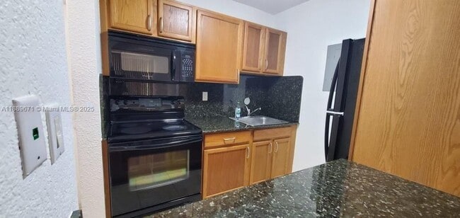 Photo - 445 SW 11th St Unit 203