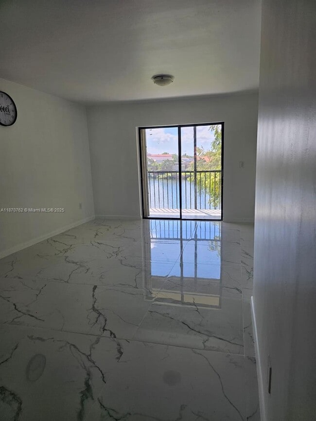 Building Photo - 6565 W 26th Dr Unit 204-34 Rental