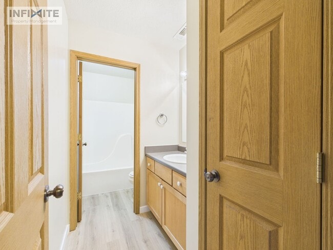 Photo - Bright & Spacious 2 Bedroom, 2 Bath Condo with Single Detached Garage – Move-In Ready!