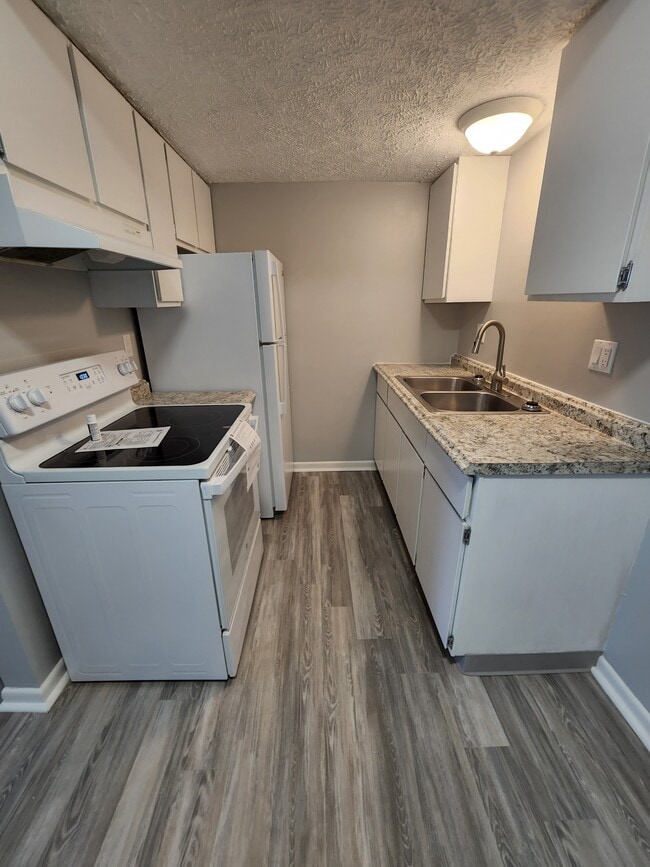 Cocina - Whispering Pine Apartments