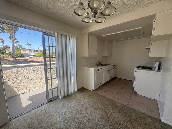 Photo - $2,395! Spacious Upstairs 2 Bedroom, 2 Bathroom Apartment with 2-Car Garage! 90710 Unit Apt 2