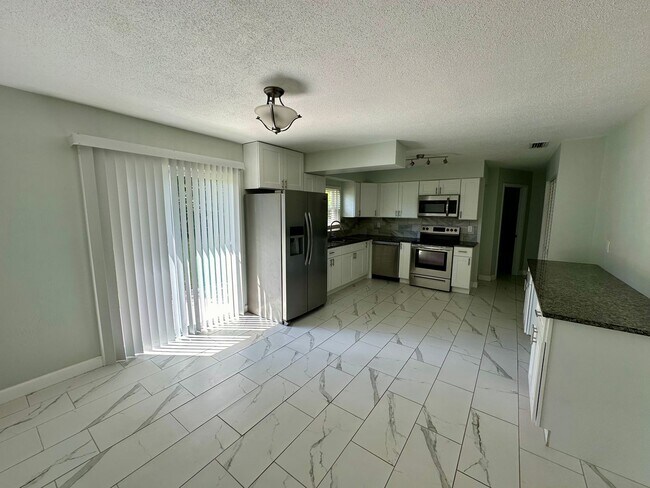 Photo - Fully remodeled 3/2 home for rent in the heart of Port Orange