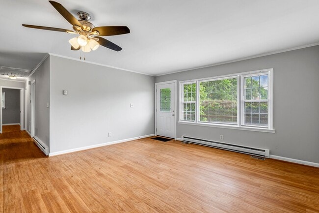 Photo - Updated Home, Stainless Steel Appliances, Wood Like Flooring, Deck, Garage!