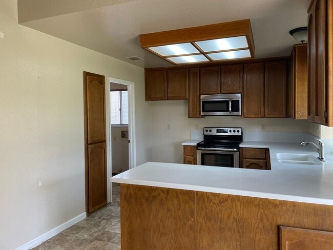 Photo - Separate Family Room and Living Room, Fireplace, RV Access