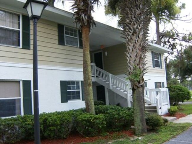Building Photo - Downstairs 2/2 Country Club Village Condo ...
