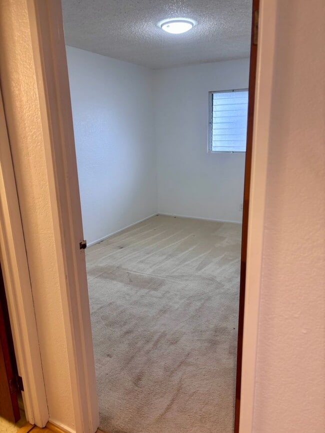 Photo - AVAILABLE NOW | 2 Bedroom, 1 Bathroom Townhome | Located at Waiau Garden Court Community | Includ...