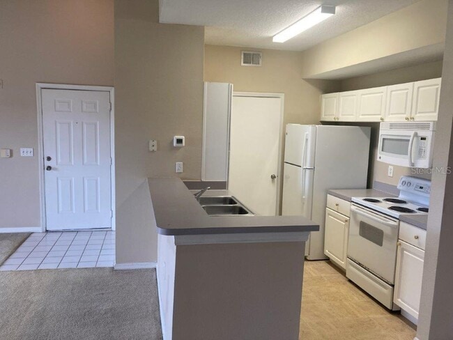Photo - 5530 Metrowest Blvd Unit 307