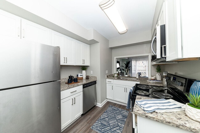 Kitchen with granite counters and stainless appliances