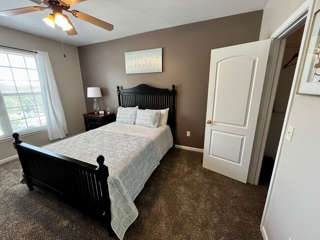Cherry Blossom Bedroom - The Woods of Cherry Creek Apartment Homes
