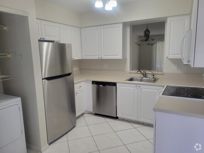 Building Photo - 7301 Amberly Ln Unit 102 Rental