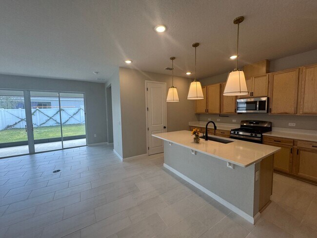 Photo - Where Modern Comfort Meets 4BD/3BA Hometown Charm — Your Story Begins in Okahumpka! FULLY-FENCED!...