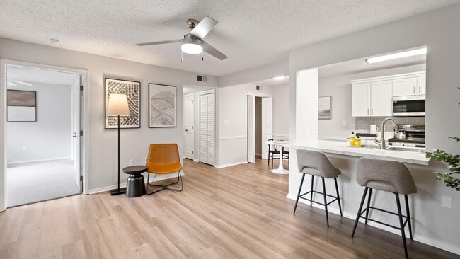 Indulge in the luxury of spacious living with generously proportioned open-concept living rooms with seamless wood-style flooring at The Avenue.