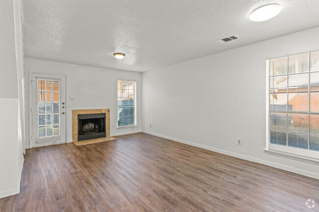 2BR, 2.5BA - 1045 SF - Living Room - Plantation West