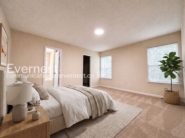 Photo - 4 Bed/3 Bath Home with Fenced Yard & Garage / Available Now!
