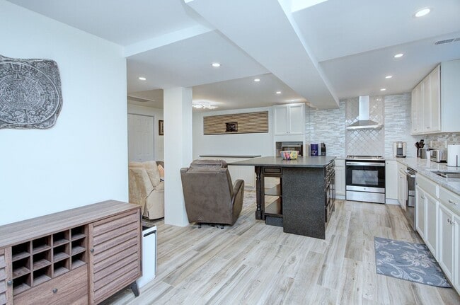 Photo - Discover the charm of this FULLY FURNISHED basement unit, tucked away in a beautifully updated bu...