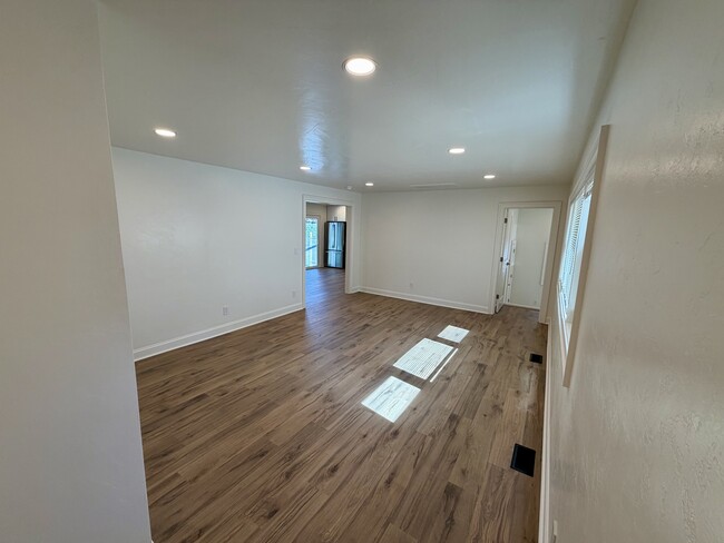 View of the living room from the front door. - 329 Ronald Dr