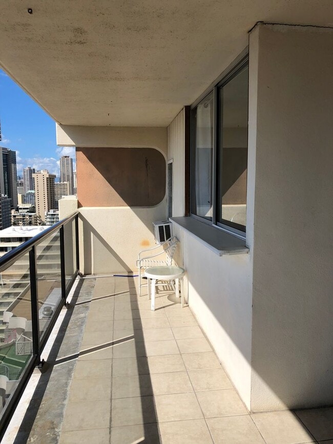Photo - 1/1/2 - Penthouse Unit- Utilities Included - Large Covered Lanai w/Ocean & City Views